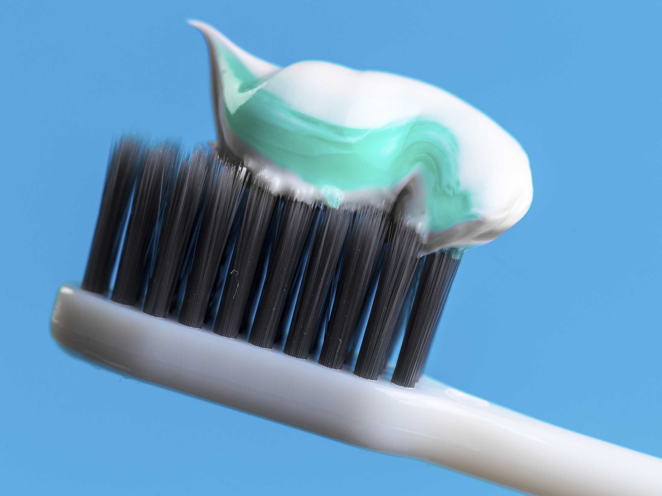 Toothbrush with toothpaste used for proper oral hygiene during orthodontic treatment in claremont, ca