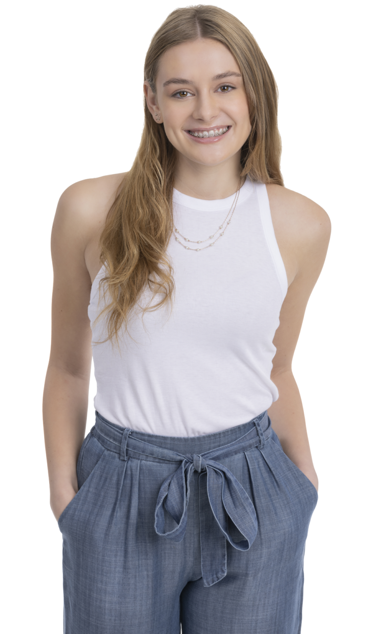 Upland CA teen girl smiling with braces, showing straight teeth from orthodontic treatment at Baseline Orthodontics Inland Empire